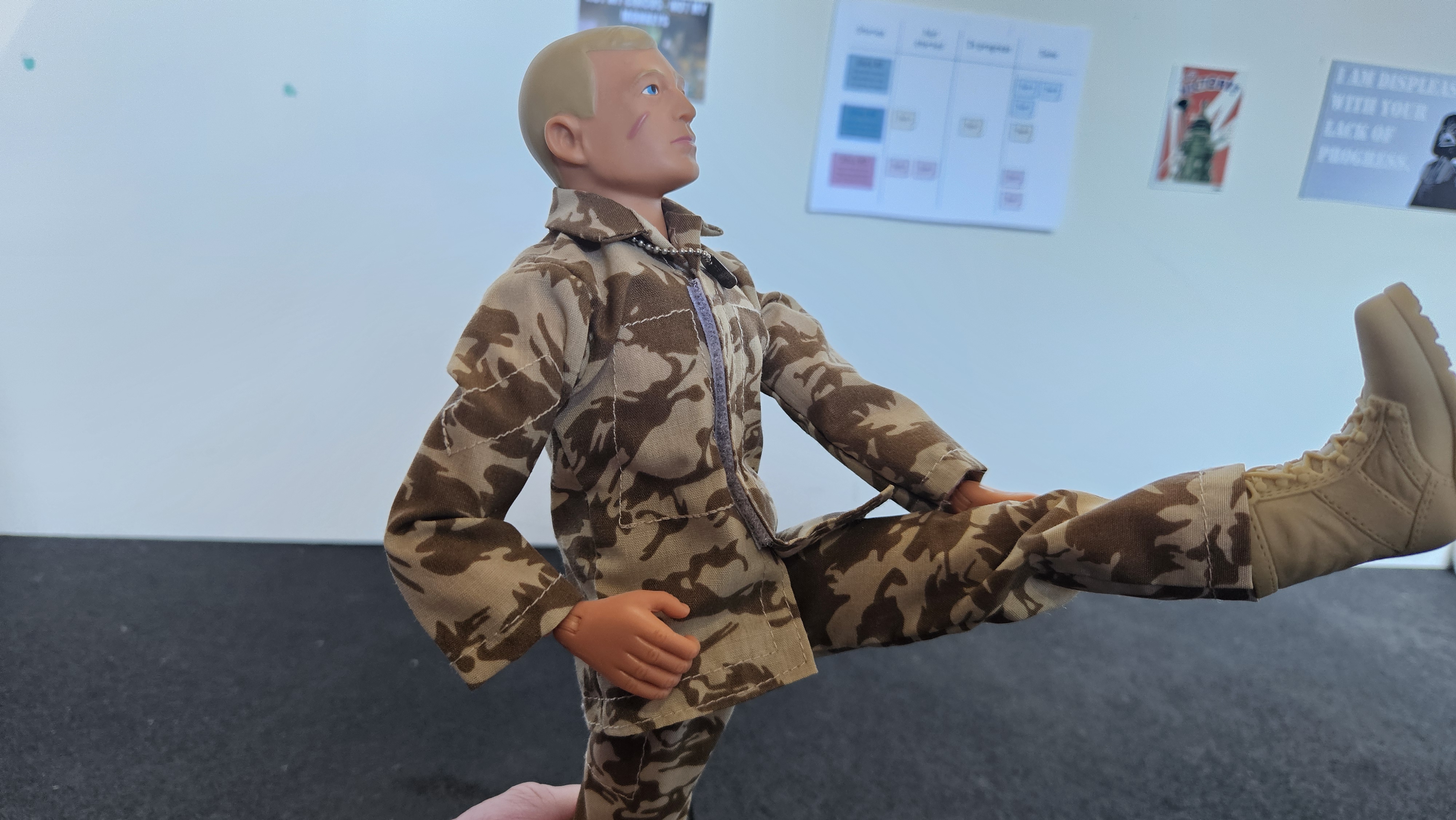 Action Man doing Extended Hand To Big Toe Pose